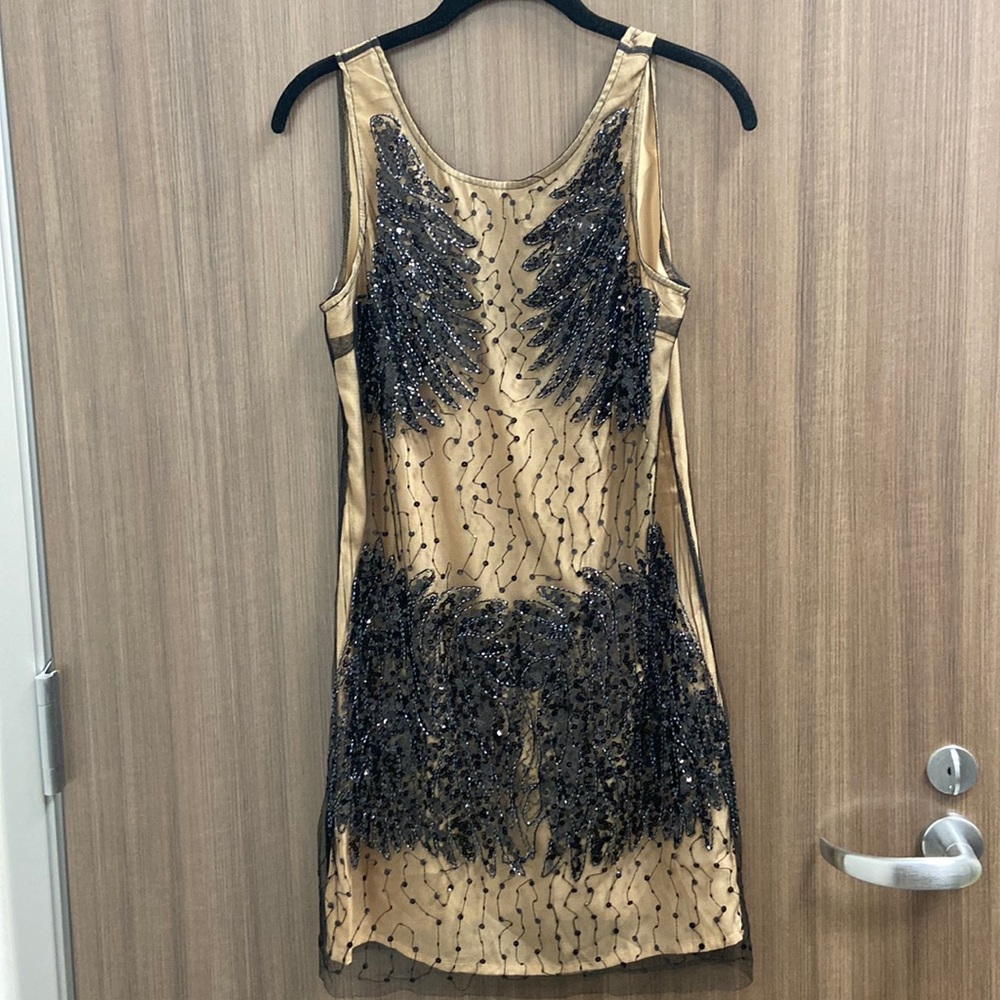 Black brand flesh colored sequin dress